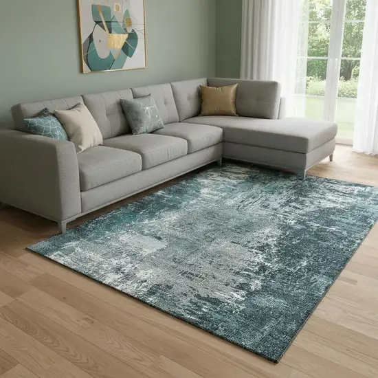 Teal And Ivory Abstract Washable Area Rug With UV Protection Photo 1