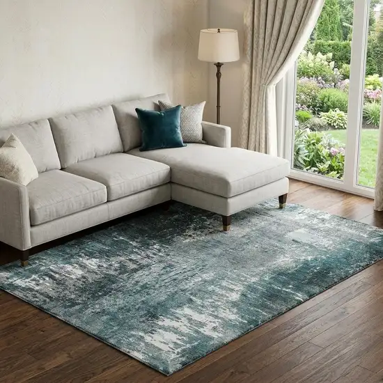 Teal And Ivory Abstract Washable Area Rug With UV Protection Photo 1