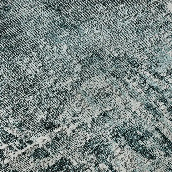 Teal And Ivory Abstract Washable Area Rug With UV Protection Photo 9