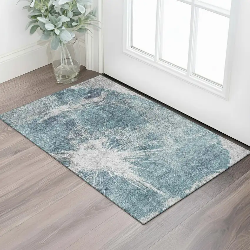 Teal And Ivory Abstract Washable Area Rug With UV Protection Photo 1
