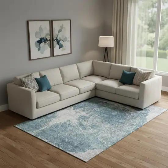 Teal And Ivory Abstract Washable Area Rug With UV Protection Photo 1