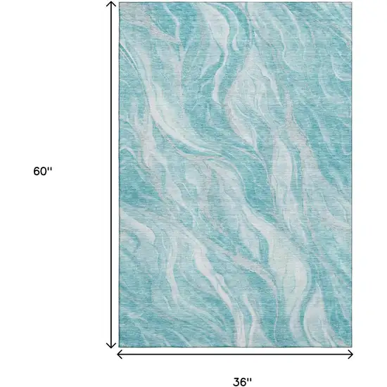 Teal And Ivory Abstract Washable Area Rug With UV Protection Photo 6