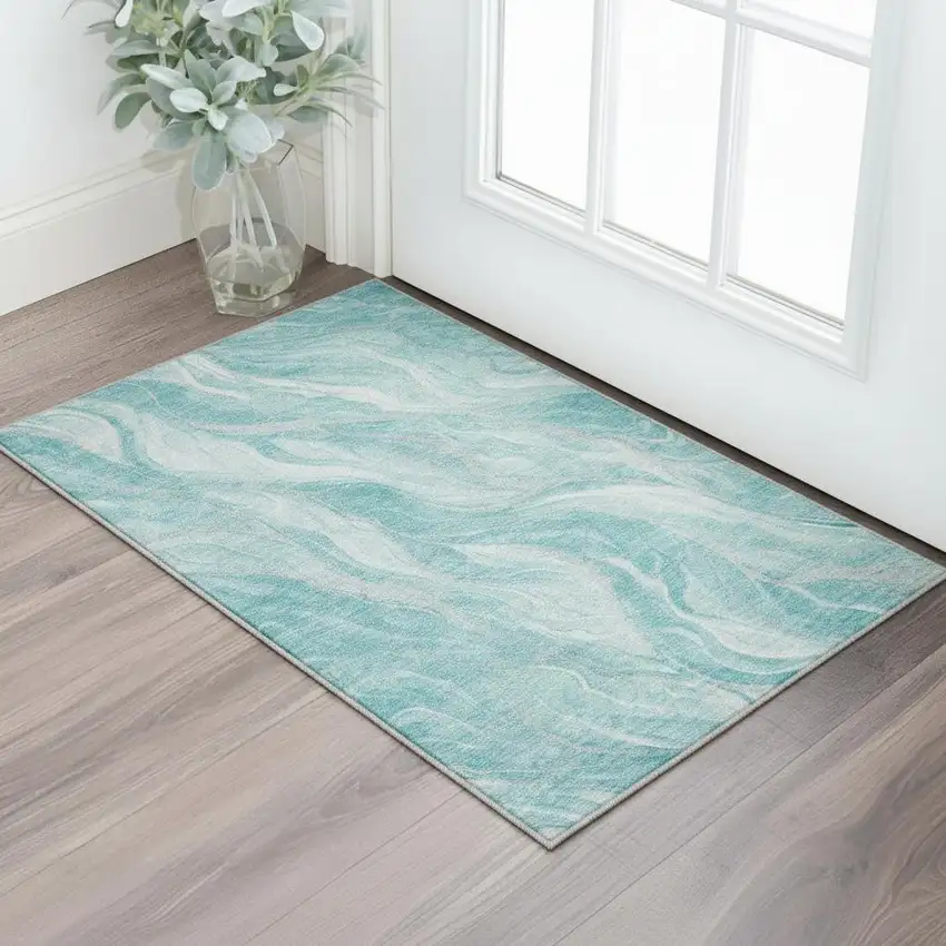 Teal And Ivory Abstract Washable Area Rug With UV Protection Photo 2