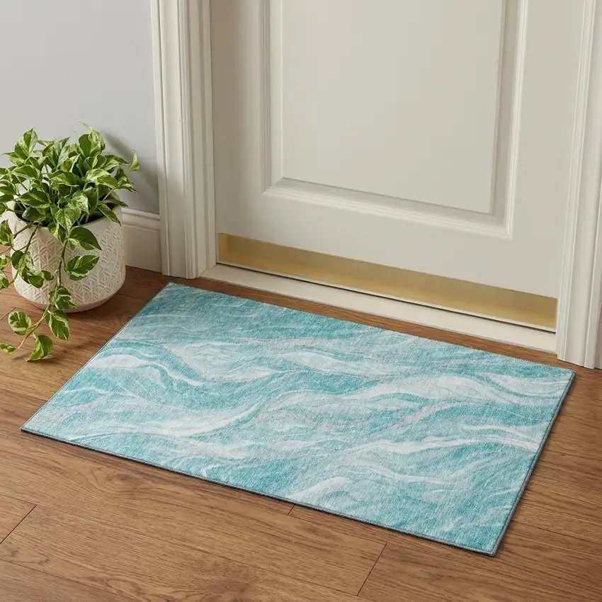 Teal And Ivory Abstract Washable Area Rug With UV Protection Photo 1