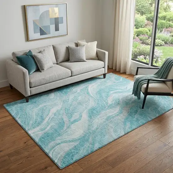 Teal And Ivory Abstract Washable Area Rug With UV Protection Photo 1