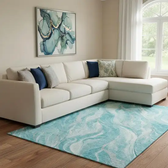 Teal And Ivory Abstract Washable Area Rug With UV Protection Photo 1