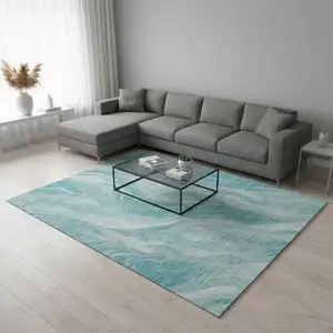 Photo of Teal And Ivory Abstract Washable Area Rug With UV Protection