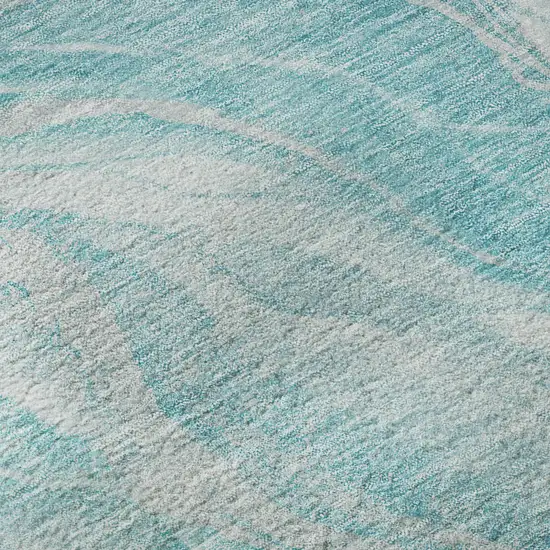 Teal And Ivory Abstract Washable Area Rug With UV Protection Photo 9