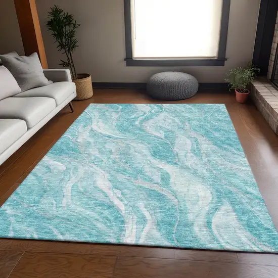 Teal And Ivory Abstract Washable Area Rug With UV Protection Photo 4