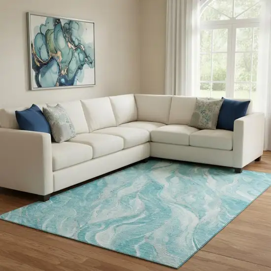 Teal And Ivory Abstract Washable Area Rug With UV Protection Photo 1