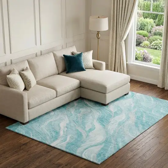 Teal And Ivory Abstract Washable Area Rug With UV Protection Photo 1