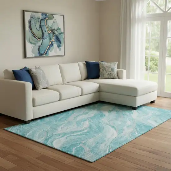 Teal And Ivory Abstract Washable Area Rug With UV Protection Photo 1
