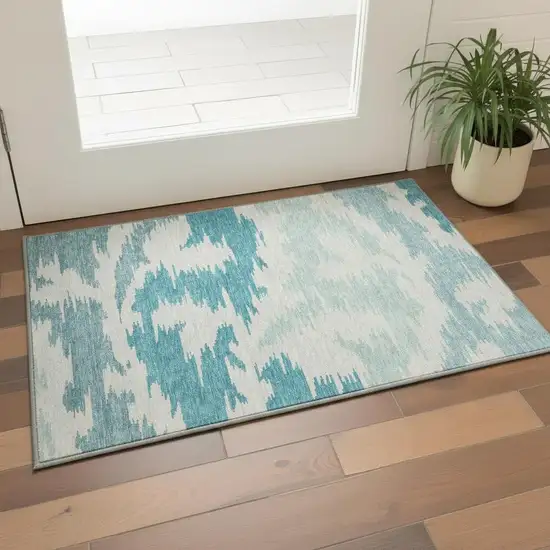 Teal And Ivory Abstract Washable Area Rug With UV Protection Photo 2
