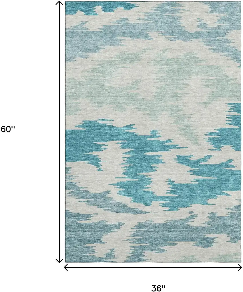 Teal And Ivory Abstract Washable Area Rug With UV Protection Photo 3