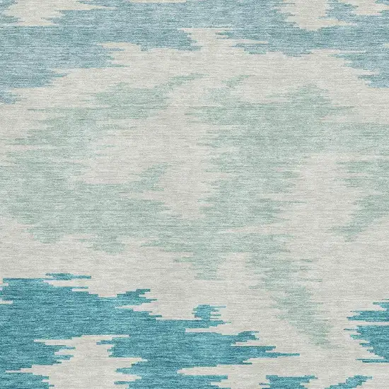 Teal And Ivory Abstract Washable Area Rug With UV Protection Photo 3
