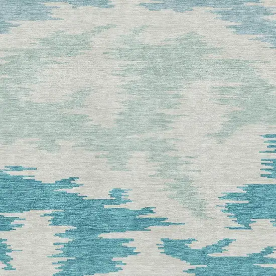 Teal And Ivory Abstract Washable Area Rug With UV Protection Photo 3