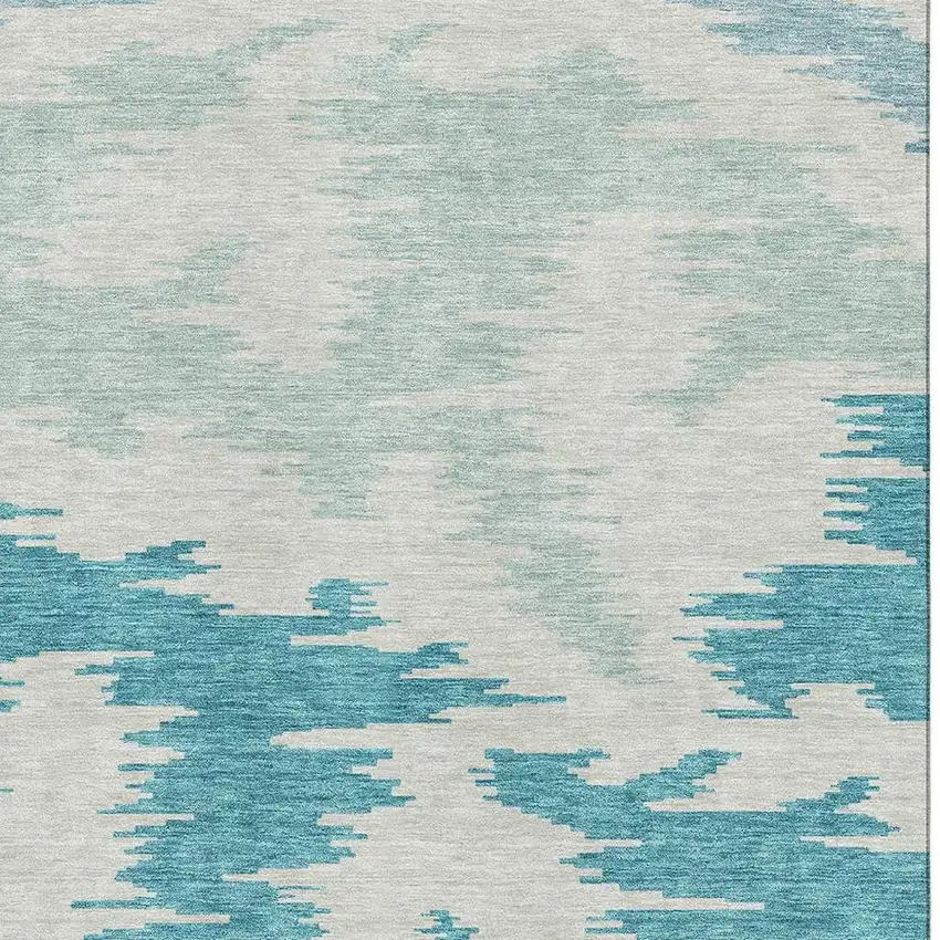 Teal And Ivory Abstract Washable Area Rug With UV Protection Photo 3