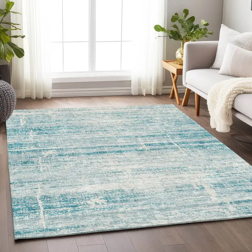 Teal And Ivory Abstract Washable Area Rug With UV Protection Photo 5