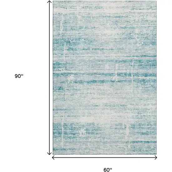 Teal And Ivory Abstract Washable Area Rug With UV Protection Photo 3