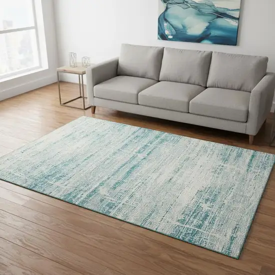 Teal And Ivory Abstract Washable Area Rug With UV Protection Photo 2