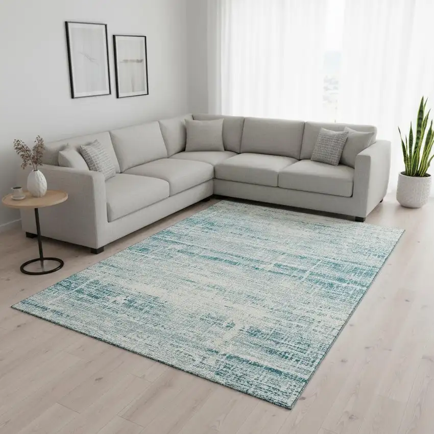 Teal And Ivory Abstract Washable Area Rug With UV Protection Photo 2