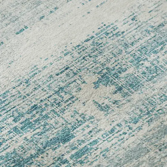Teal And Ivory Abstract Washable Area Rug With UV Protection Photo 9