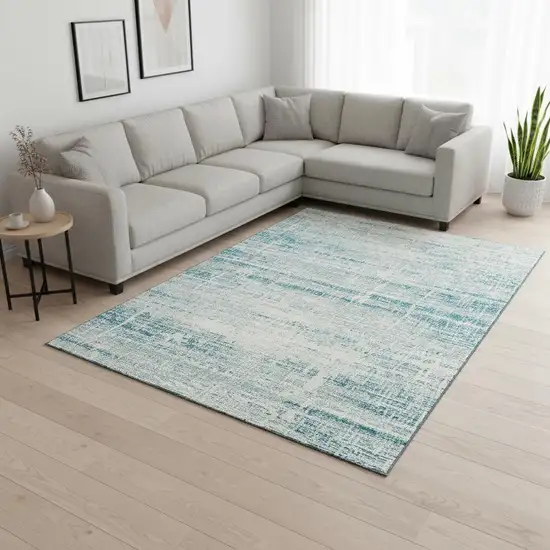 Teal And Ivory Abstract Washable Area Rug With UV Protection Photo 2