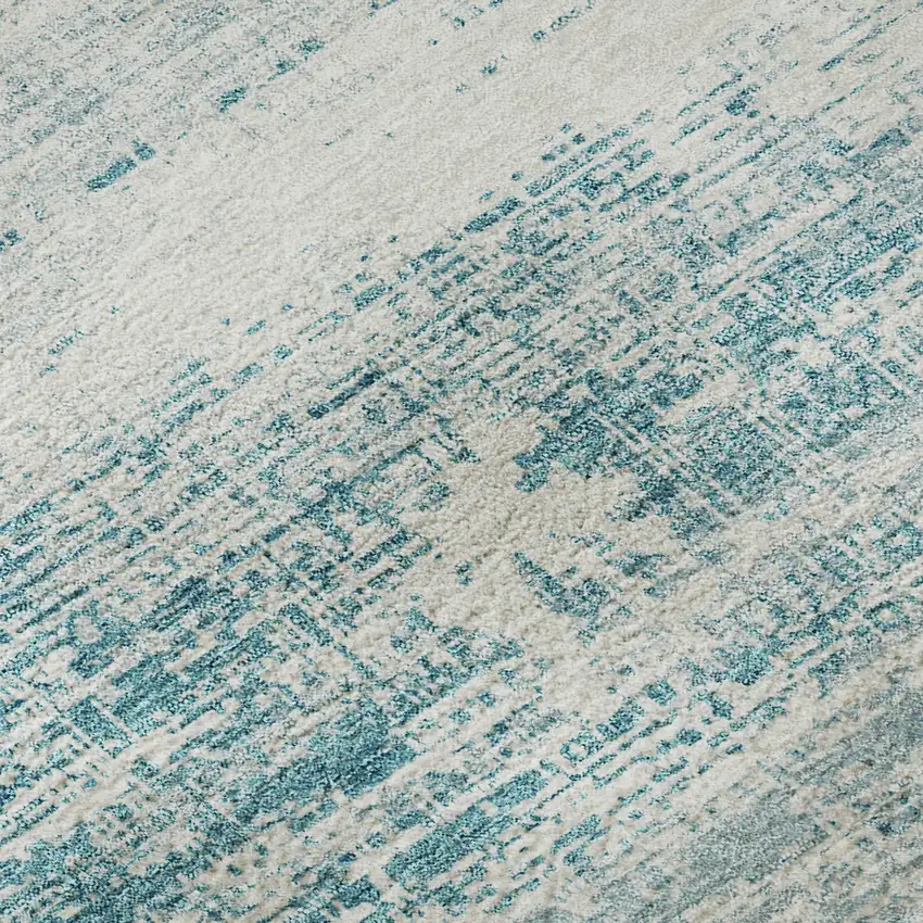 Teal And Ivory Abstract Washable Area Rug With UV Protection Photo 9