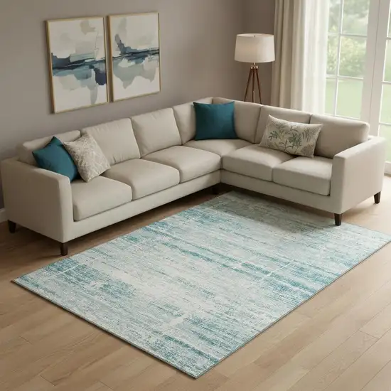Teal And Ivory Abstract Washable Area Rug With UV Protection Photo 1