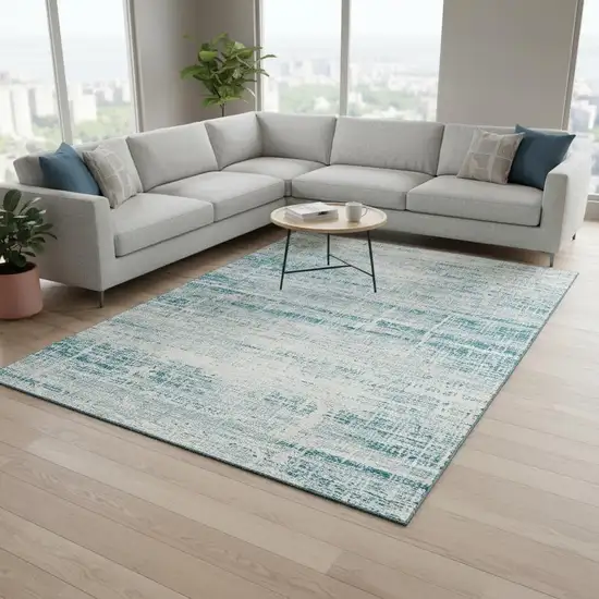 Teal And Ivory Abstract Washable Area Rug With UV Protection Photo 2