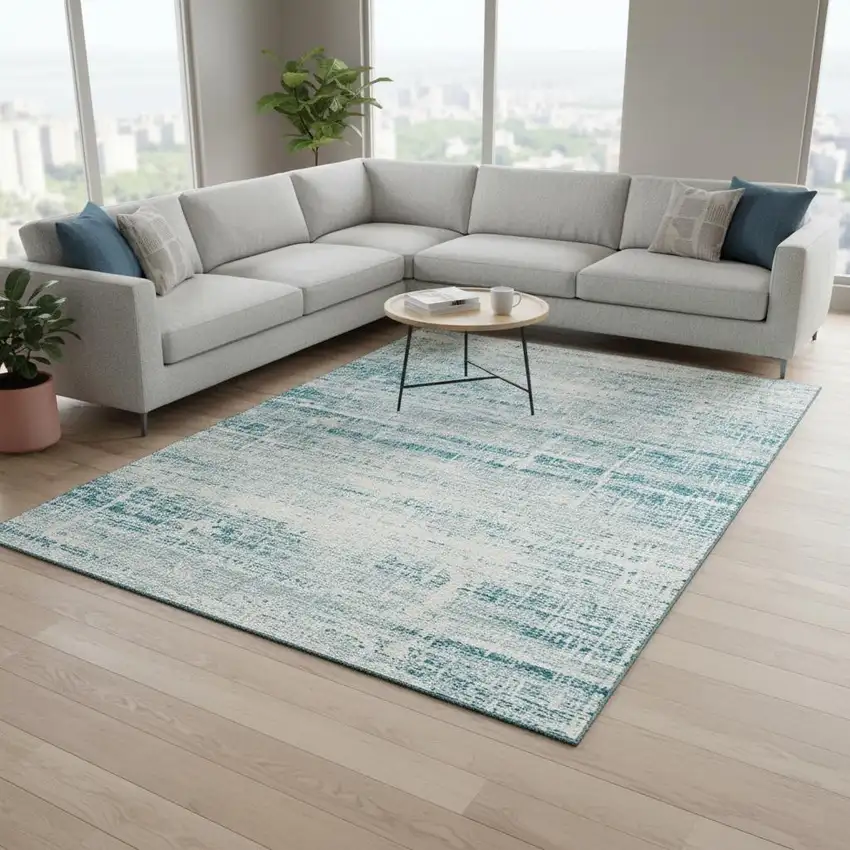 Teal And Ivory Abstract Washable Area Rug With UV Protection Photo 2