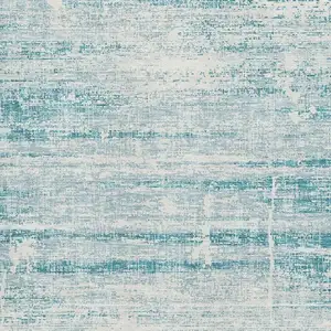 Photo of Teal And Ivory Abstract Washable Area Rug With UV Protection
