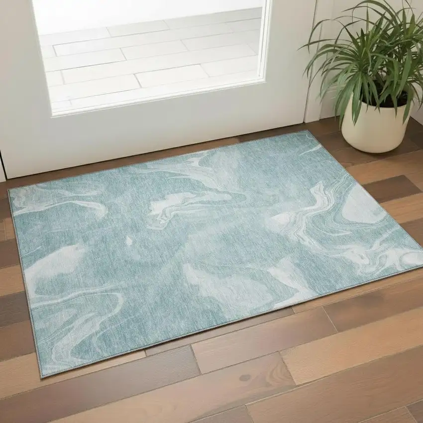 Teal And Ivory Abstract Washable Area Rug With UV Protection Photo 1