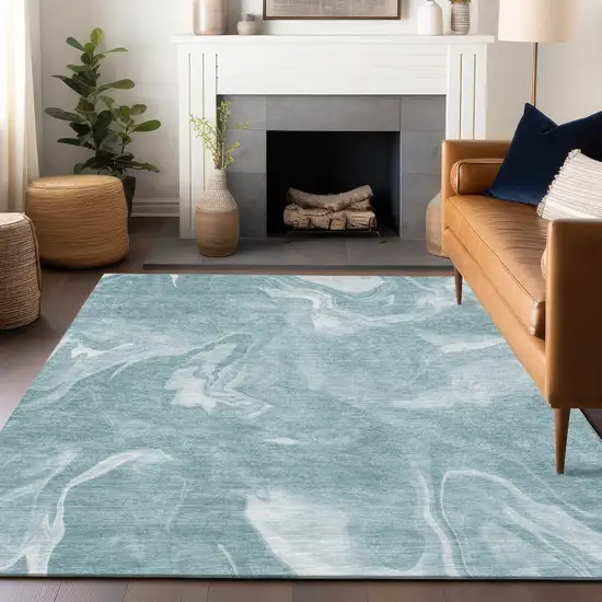 Teal And Ivory Abstract Washable Area Rug With UV Protection Photo 6