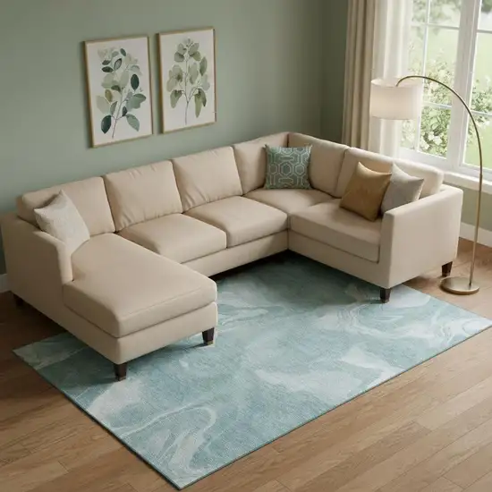Teal And Ivory Abstract Washable Area Rug With UV Protection Photo 1