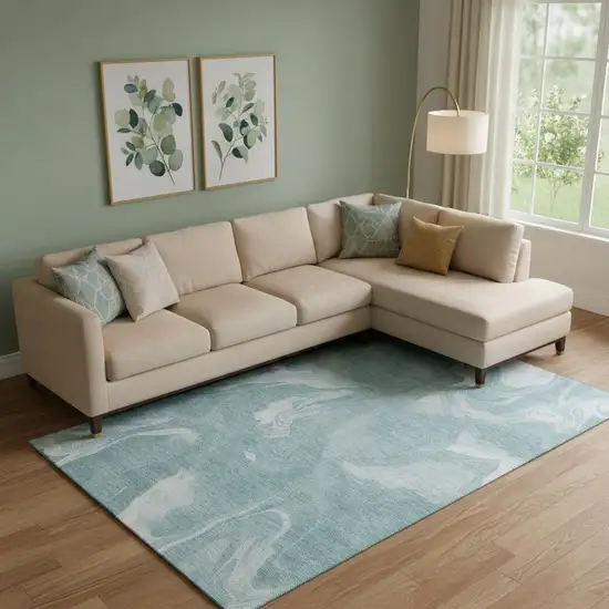 Teal And Ivory Abstract Washable Area Rug With UV Protection Photo 1