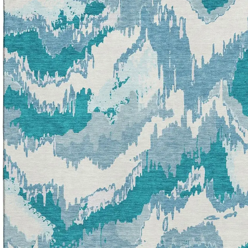 Teal And Ivory Abstract Washable Area Rug With UV Protection Photo 5