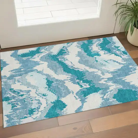 Teal And Ivory Abstract Washable Area Rug With UV Protection Photo 1