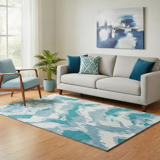 Teal And Ivory Abstract Washable Area Rug With UV Protection Photo 1