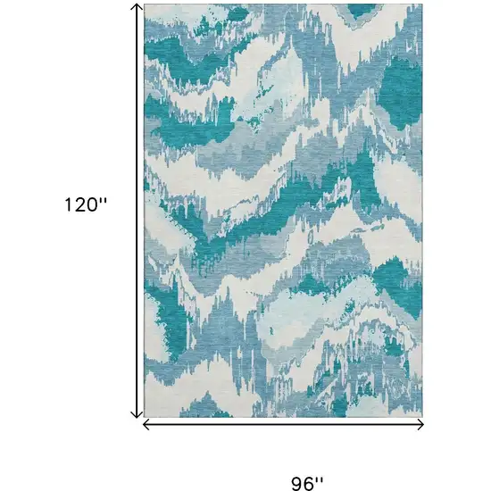 Teal And Ivory Abstract Washable Area Rug With UV Protection Photo 3