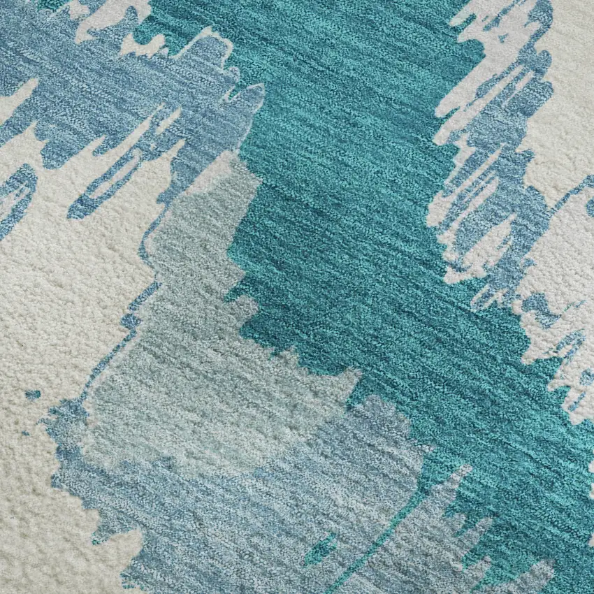 Teal And Ivory Abstract Washable Area Rug With UV Protection Photo 4