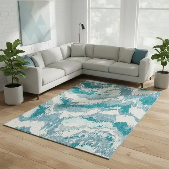 Teal And Ivory Abstract Washable Area Rug With UV Protection Photo 1