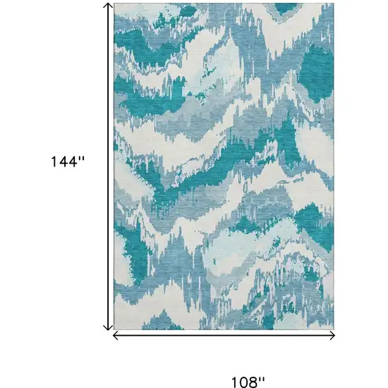 Teal And Ivory Abstract Washable Area Rug With UV Protection Photo 3