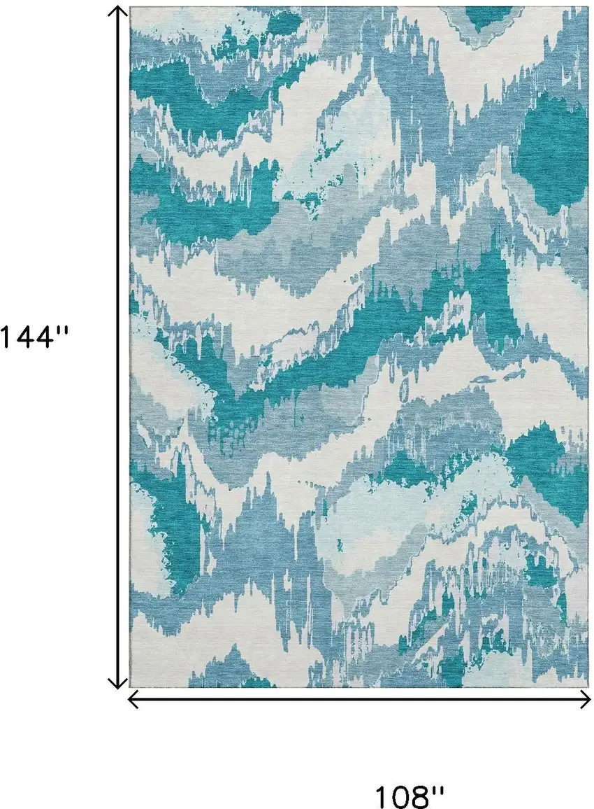 Teal And Ivory Abstract Washable Area Rug With UV Protection Photo 3