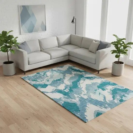 Teal And Ivory Abstract Washable Area Rug With UV Protection Photo 1
