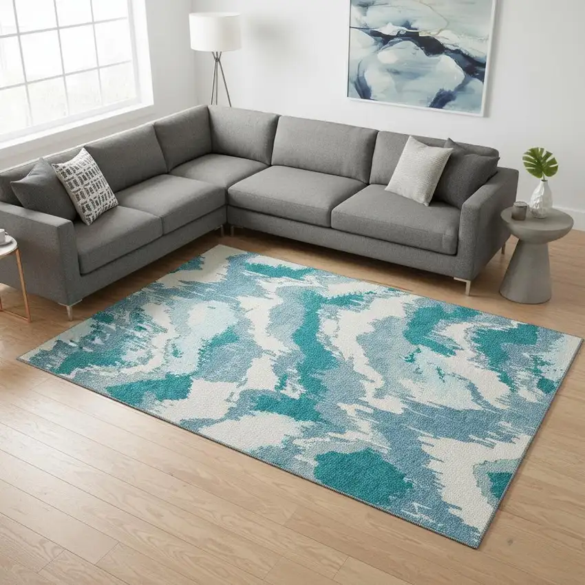 Teal And Ivory Abstract Washable Area Rug With UV Protection Photo 1