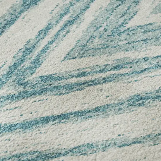 Teal And Ivory Abstract Washable Area Rug With UV Protection Photo 9