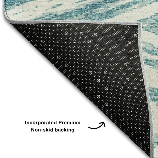 Teal And Ivory Abstract Washable Area Rug With UV Protection Photo 6