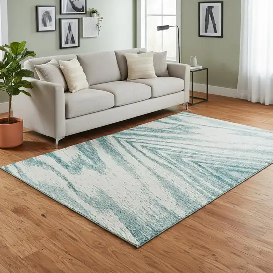 Teal And Ivory Abstract Washable Area Rug With UV Protection Photo 2