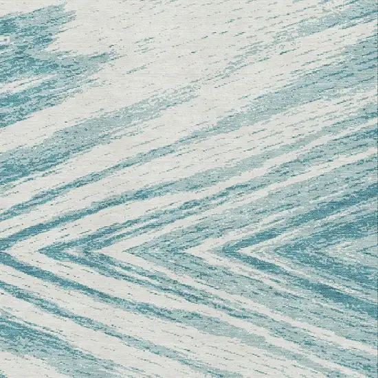 Teal And Ivory Abstract Washable Area Rug With UV Protection Photo 3